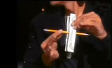 ديفيد كوبرفيلد يضلل الجمهور في كيفية مرور القلم داخل النقود دون شقها